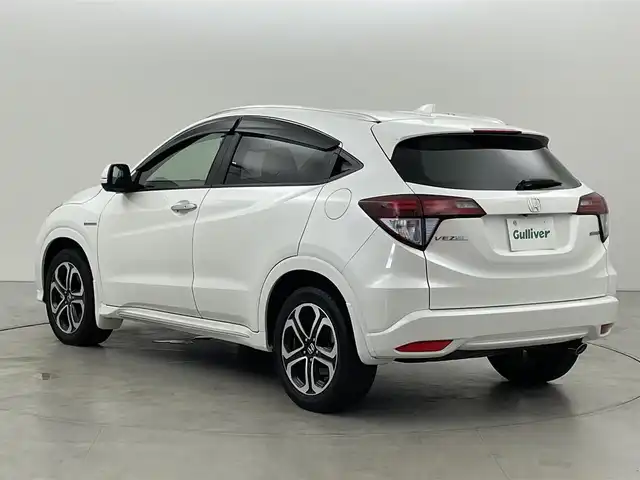 ホンダ ヴェゼル ハイブリッド Z ホンダセンシング 福岡県 2018(平30)年 5万km ホワイトオーキッドパール 純正ナビ（フルセグＴＶ）　/バックカメラ　/ビルトインＥＴＣ　/前後ドラレコ　/アダプティブクルコン　/衝突被害軽減ブレーキ　/レーンキープ　/パドルシフト　/ハーフレザー　/シートヒーター　/純正１７インチＡＷ　/ＬＥＤ