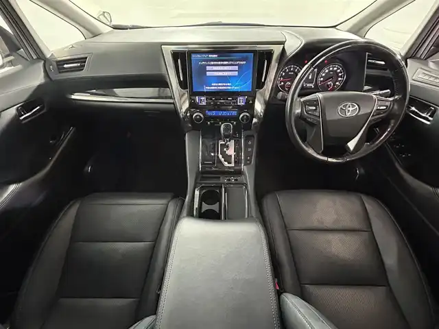トヨタ ヴェルファイア Z Gエディション 佐賀県 2018(平30)年 8.5万km ホワイトパールクリスタルシャイン 社外アルパイン製11インチナビ【EX１１Z】/【フルセグTV.CD.DVD.Bluetooth】/社外12.8インチフリップダウンモニター/ツインムーンルーフ/デジタルインナールームミラー/衝突被害軽減システム/レーダークルーズコントロール/レーンアシスト/パーキングサポートブレーキ/クリアランスソナー/カーテンエアバッグ/ロードサインアシスト/オートブレーキホールド/オートマチックハイビーム/オートライト/バックカメラ/3眼LEDヘッドライト/前方ドライブレコーダー/両側パワースライドドア/パワーバッグドア/運転席・助手席パワーシート/メモリーシート/運転席・助手席シートヒーター/運転席・助手席エアシート/ビルトインETC/ステアリングヒーター/純正18インチアルミホイール/合皮シート/フォグライト