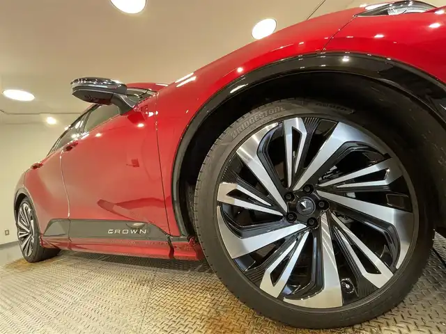 トヨタ クラウン スポーツ Z 愛知県 2024(令6)年 1.1万km 赤 ワンオーナー/パノラマルーフ/モデリスタエアロ(前 横 後下 後)/モデリスタ21インチアルミホイール付/革シート/前席パワーシート/前席シートヒーター/前席エアシート/純正メモリナビ/(フルセグTV/Bluetooth/USB)/パノラミックビューモニター/デジタルインナーミラー/ハンズフリーパワーバックドア/トヨタチームメイト/・リモート機能付アドバンスドパーク/セーフティセンス/・プリクラッシュセーフティ/・フロントクロストラフィックアラート/・レーントレーシングアシスト/・レーンチェンジアシスト/・レーンディパーチャーアラート/・レーダークルーズコントロール/・ロードサインアシスト/・プロアクティブドライビングアシスト/・アダプティブハイビームシステム/・ドライバー異常時対応システム/・発進遅れ告知機能/リアクロストラフィックアラート/パーキングサポートブレーキ/置くだけ充電/ブラインドスポットモニター/ヘッドアップディスプレイ/純正21インチアルミホイール/スマートキー×２/LEDヘッドライト/ビルトインETC2.0/前後ドライブレコーダー/新車時保証書/取説