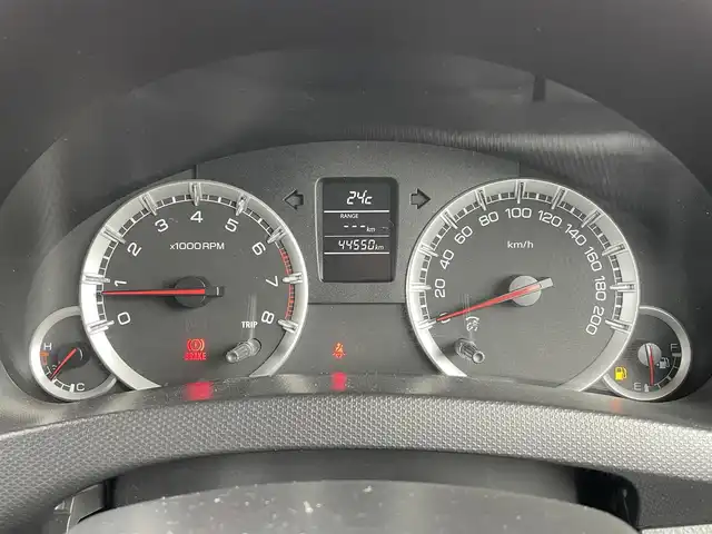 スズキ スイフト XG 岩手県 2012(平24)年 4.4万km スノーホワイトパール 禁煙車/5MT/LEDヘッドライト/プッシュスタート/電動格納ミラー/純正オーディオ/→CD/FM/AM/〇パワーウィンドウ/〇シガーソケット/トノカバー