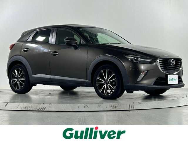 マツダ ＣＸ－３ XD ツーリング 佐賀県 2015(平27)年 4.4万km チタニウムフラッシュマイカ ワンオーナー/純正ナビ/（ＡＭ　ＦＭ　ＣＤ　ＤＶＤ　ＢＴ　ＵＳＢ　ＡＵＸ）/フルセグ　/バックカメラ/ＥＴＣ　/スマートキー/プッシュスタート/クルーズコントロール　/ブラインドスポットモニター/衝突軽減ブレーキ　/横滑り防止装置　/ハーフレザーシート/純正LEDライト/純正アルミホイール　/保証書/取扱説明書
