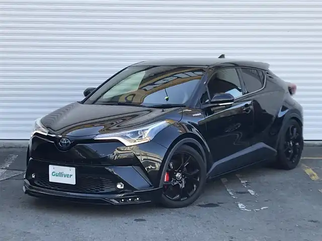 トヨタ Ｃ－ＨＲ G モード ネロ 和歌山県 2019(平31)年 8.1万km ブラックマイカ 純正SDナビ(NSZT-Y68T)/　AM/FM/CD/DVD/TV/BT/社外エアロパーツ(M’Zスピード)/社外マフラー(M’Zスピード)/TEIN車高調/キャリパーカバー/ToyotaSafetySense/   衝突軽減ブレーキ/　レーンキープアシスト/   ブラインドスポットモニター/　レーダークルーズコントロール/   クリアランスソナー等/横滑り防止装置/ビルトインETC/オートライト/オートマチックハイビーム/ステアリングスイッチ/革巻きステアリング/シートヒーター(D+N席)/プッシュスタート/取扱説明書/保証書