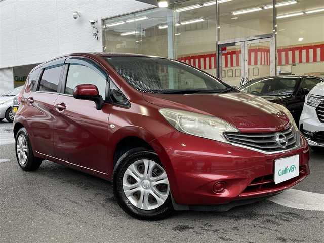 日産 ノート X 神奈川県 2012(平24)年 3万km ラディアントレッド 登録時走行距離29604km/ワンオーナー/純正メモリナビ/　【CD/ワンセグTV】/バックカメラ/ETC/パドルシフト/ステアリングヒーター/ヘッドライトレベライザー/スマートキー/プッシュスタート/アイドリングストップ/ドアバイザー/フロアマット/リアプライバシーガラス/スペアキー×1/新車時整備手帳（保証書）/取扱説明書