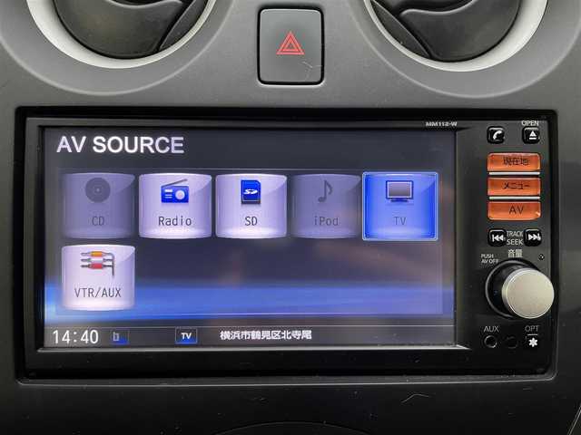 日産 ノート X 神奈川県 2012(平24)年 3万km ラディアントレッド 登録時走行距離29604km/ワンオーナー/純正メモリナビ/　【CD/ワンセグTV】/バックカメラ/ETC/パドルシフト/ステアリングヒーター/ヘッドライトレベライザー/スマートキー/プッシュスタート/アイドリングストップ/ドアバイザー/フロアマット/リアプライバシーガラス/スペアキー×1/新車時整備手帳（保証書）/取扱説明書