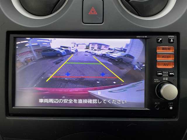 日産 ノート X 神奈川県 2012(平24)年 3万km ラディアントレッド 登録時走行距離29604km/ワンオーナー/純正メモリナビ/　【CD/ワンセグTV】/バックカメラ/ETC/パドルシフト/ステアリングヒーター/ヘッドライトレベライザー/スマートキー/プッシュスタート/アイドリングストップ/ドアバイザー/フロアマット/リアプライバシーガラス/スペアキー×1/新車時整備手帳（保証書）/取扱説明書