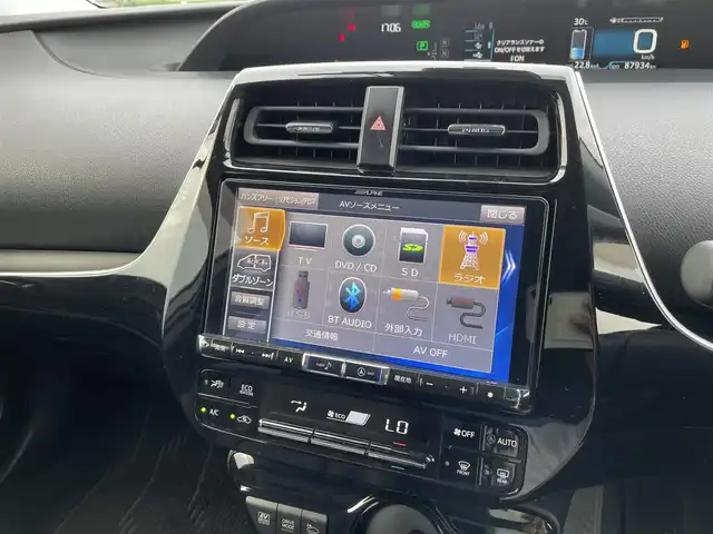 トヨタ プリウス Sツーリングセレクション 佐賀県 2020(令2)年 8.8万km グレーメタリック ALPINE製9型ナビゲーション「X9Z」/・AM/FM/CD/DVD/フルセグ//・バックカメラ/黒皮シート/・シートヒーター「運転席/助手席」/社外フルエアロ/後席スモークフィルム/ドアバイザー/純正17インチアルミホイール/LEDヘッドライト/・オートマチックハイビーム/USB入力端子/前方ドライブレコーダー/純正フロアマット/スマートキー/Toyota Safety Sense/・プリクラッシュセーフティ/・レーダークルーズコントロール（全車速追従機能付）/・レーンディパーチャーアラート（ステアリング制御付）/・インテリジェントクリアランスソナー（踏み間違い防止）/・パーキングサポートブレーキ/・ABS（EBD＋ブレーキアシスト）/・VSC（車両安定制御システム）/・TRC（トラクションコントロール）/・ヒルスタートアシストコントロール/・イモビライザー（盗難防止）