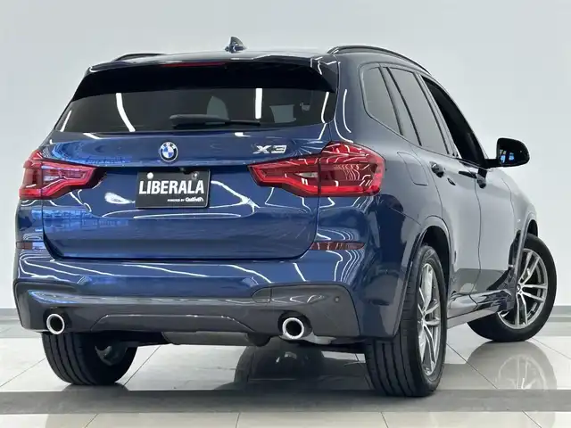 ＢＭＷ Ｘ３ xDrive20d Mスポーツ 岡山県 2018(平30)年 3.9万km ファイトニックブルー 純正ｉＤｒｉｖｅ/３６０°カメラ/ＨＵＤ/ワイヤレス充電トレイ　/ドラレコ（下）/ＡＣＣ/ヒルディセントコントロール/衝突警告/歩行者警告/車線逸脱警告/車線変更警告/側面衝突警告/Ｂｌｕｅｔｏｏｔｈ/フルセグTV/アダプティブLED/オートライト/オートハイビーム/オートワイパー/ブラックキドニーグリル/PTG