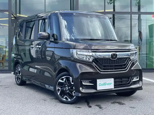 ホンダ Ｎ ＢＯＸ カスタム G L ターボ ホンダセンシング 愛媛県 2020(令2)年 3.9万km プレミアムグラマラスブロンズP 純正ナビ(Bluetooth/CD/DVD)/フルセグTV/両側パワースライドドア/バックカメラ/ビルトインETC/アダプティブクルーズコントロール/ソナーセンサー/ホンダセンシング/オートハイビーム/ターボ/LEDヘッドランプ/本革巻きステアリング/パドルシフト/合皮/トリコットコンビシート/前席シートヒーター/純正15インチアルミホイール/スマートキーシステム/禁煙車/チップアップ/ISOFIX/ドアバイザー/ステアリングリモコン