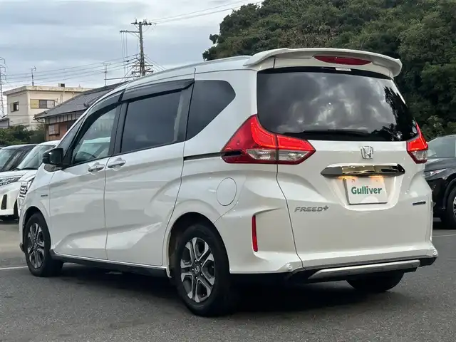ホンダ フリード＋ ハイブリット クロスター ホンダセンシング 大阪府 2020(令2)年 5.1万km プラチナホワイトパール 純正9型ナビ(BT/CD/DVD/USB/フルセグ)/バックカメラ/衝突被害軽減システム/レーンキープアシスト/コーナーセンサー/クルーズコントロール/オートライト/オートマチックハイビーム/純正アルミホイール/純正フロアマット/前後ドライブレコーダー/ビルトインETC/両側パワースライドドア/ルーフレール/アイドリングストップ/スペアキー×1/LEDヘッドライト