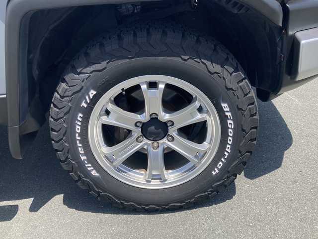 トヨタ ＦＪクルーザー 三重県 2014(平26)年 5.5万km セメントグレーM/ホワイト ディーラーナビ　/フルセグＴＶ　/ＣＤ　/ＤＶＤ再生　/バックカメラ　/革巻きステアリング　/オフロードタイヤ　/ＬＥＤヘッドライト　　/寒冷地ワイパー　/コーナーセンサー　/クルーズコントロール　/ドライブレコーダー