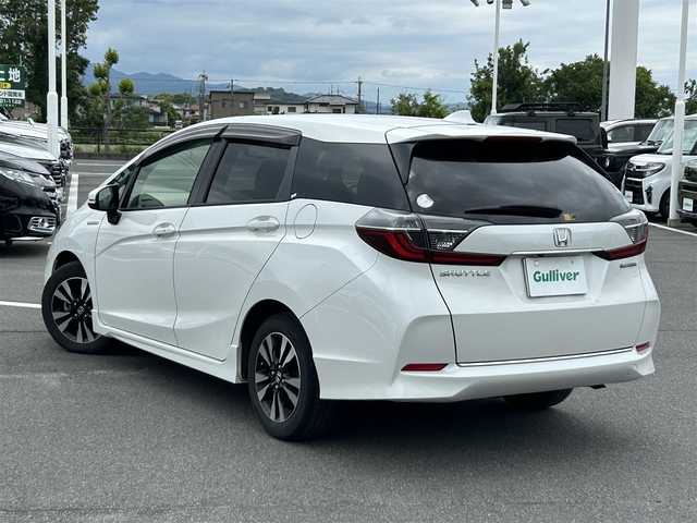 ホンダ シャトル ハイブリッド X ホンダセンシング 奈良県 2019(令1)年 5.6万km プラチナホワイトパール ホンダセンシング　/純正ナビ　/フルセグTV　/ビルドインETC　/Bluetooth　/CDチェンジャー　/DVD再生機能　/スマートキー/スペアキー/バックカメラ/パドルシフト/シートヒーター　/純正フロアマット　/純正アルミホイール　/クルーズコントロール/衝突被害軽減システム/LEDヘッドライト/オートライト　/オートマチックハイビーム