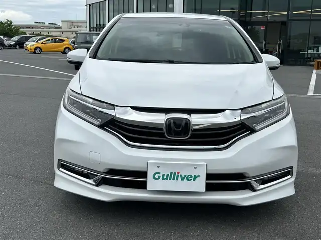 ホンダ シャトル ハイブリッド X ホンダセンシング 奈良県 2019(令1)年 5.6万km プラチナホワイトパール ホンダセンシング　/純正ナビ　/フルセグTV　/ビルドインETC　/Bluetooth　/CDチェンジャー　/DVD再生機能　/スマートキー/スペアキー/バックカメラ/パドルシフト/シートヒーター　/純正フロアマット　/純正アルミホイール　/クルーズコントロール/衝突被害軽減システム/LEDヘッドライト/オートライト　/オートマチックハイビーム