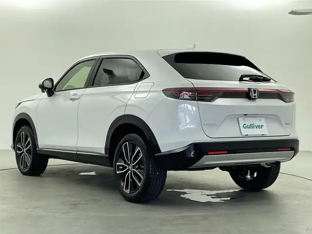 ホンダ ヴェゼル ハイブリッド e:HEV Z 福井県 2025(令7)年 0.1千km プラチナホワイトパール 登録済未使用車　/Ｈｏｎｄａ　ＣＯＮＮＥＣＴディスプレイオーディオ/（ナビ機能付き）/オプションフロントグリル　（ベルリナブラック）/置くだけ充電　/ハーフレザーシート　/シートヒーター　/ハンドルヒーター　/スペアキー　/純正ビルトインＥＴＣ２．０/純正アルミホイール/ABS/レーンキープアシスト/横滑り防止装置/オートライト/前後コーナーセンサー/ヒルディセントコントロール/LEDヘッドライト