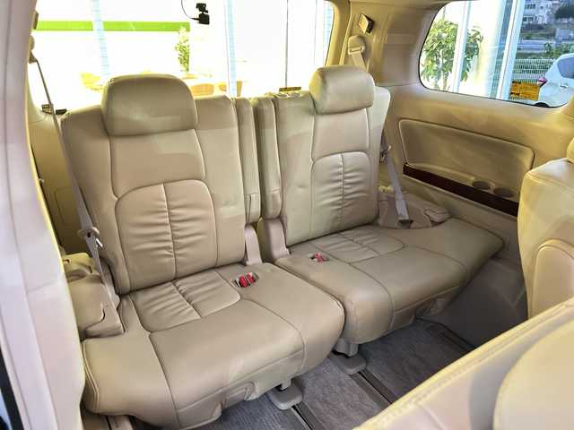 トヨタ ヴェルファイア 2．4V 愛媛県 2010(平22)年 9.6万km ホワイトパールクリスタルシャイン フリップダウンモニター/純正ナビ（NHZN-W60G）/・Bluetooth/・CD/DVD/フルセグTV/バックカメラ/ETC/両側パワースライドドア/ステアリングスイッチ/オートライト/オートマチックハイビーム/コーナセンサー/リモコンキー/スペアキー/保証書/取扱説明書