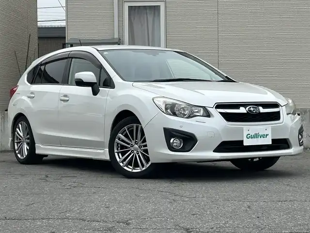スバル インプレッサ スポーツ 2．0i－S アイサイト 青森県 2013(平25)年 6.1万km サテンホワイトパール 4WD/社外ナビ/・フルセグTV/AM/FM/CD/DVD/BT/純正17AW/ETC/D席パワーシート/HID/純正フロアマット/コーナーセンサー/フォグランプ/オートライト/クルーズコントロール/パドルシフト/レーンキープアシスト/車線逸脱警報/衝突軽減ブレーキ/横滑り防止機能/冬タイヤ積み込み有/取扱説明書