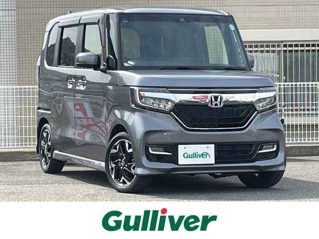 ホンダ Ｎ ＢＯＸ カスタム G L ターボ ホンダセンシング 山口県 2019(令1)年 6.9万km シャイニンググレーM ターボ/両側パワースライドドア/メモリナビ フルセグTV CD DVD BT/バックカメラ/ドラレコ/ビルトイン ETC/スマートキー 2個/衝突被害軽減ブレーキ/レーダークルーズコントロール/レーンアシスト/オートマチックハイビーム/LEDオートヘッドライト/フォグライト/ハーフレザーシート/8スピーカー/バックソナー/パドルシフト/W サイド カーテン エアバッグ/保証書 取説 ナビ取説/禁煙車