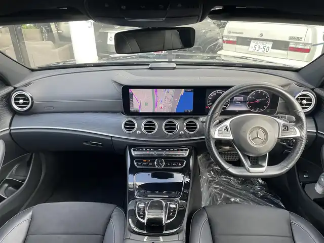 メルセデス・ベンツ Ｅ２００ SW アバンギャルド スポーツ 千葉県 2018(平30)年 5万km カバンサイトブルー 245/40R19/アクティブブレーキアシスト/アクティブレーンキーピングアシスト/ブラインドスポットアシスト/アテンションアシスト/パワーバックドア/ハーフレザーシート/前席パワーシート/シートヒーター/純正HDDナビ/地デジTV/【Bluetooth接続】/【Apple CarPlay　Android Auto対応】/360°カメラ/ディストロニック/革巻きステアリング/ステアリングスイッチ/パドルシフト/ETC（2.0）/LEDヘッドライト/フォグライト/ウインカーミラー/パークトロニック/純正19インチアルミホイル/サイド/カーテンエアバッグ/キーレスゴー