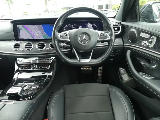 メルセデス・ベンツ Ｅ２００ SW アバンギャルド スポーツ 千葉県 2018(平30)年 5万km カバンサイトブルー 245/40R19/アクティブブレーキアシスト/アクティブレーンキーピングアシスト/ブラインドスポットアシスト/アテンションアシスト/パワーバックドア/ハーフレザーシート/前席パワーシート/シートヒーター/純正HDDナビ/地デジTV/【Bluetooth接続】/【Apple CarPlay　Android Auto対応】/360°カメラ/ディストロニック/革巻きステアリング/ステアリングスイッチ/パドルシフト/ETC（2.0）/LEDヘッドライト/フォグライト/ウインカーミラー/パークトロニック/純正19インチアルミホイル/サイド/カーテンエアバッグ/キーレスゴー