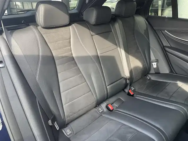 メルセデス・ベンツ Ｅ２００ SW アバンギャルド スポーツ 千葉県 2018(平30)年 5万km カバンサイトブルー 245/40R19/アクティブブレーキアシスト/アクティブレーンキーピングアシスト/ブラインドスポットアシスト/アテンションアシスト/パワーバックドア/ハーフレザーシート/前席パワーシート/シートヒーター/純正HDDナビ/地デジTV/【Bluetooth接続】/【Apple CarPlay　Android Auto対応】/360°カメラ/ディストロニック/革巻きステアリング/ステアリングスイッチ/パドルシフト/ETC（2.0）/LEDヘッドライト/フォグライト/ウインカーミラー/パークトロニック/純正19インチアルミホイル/サイド/カーテンエアバッグ/キーレスゴー