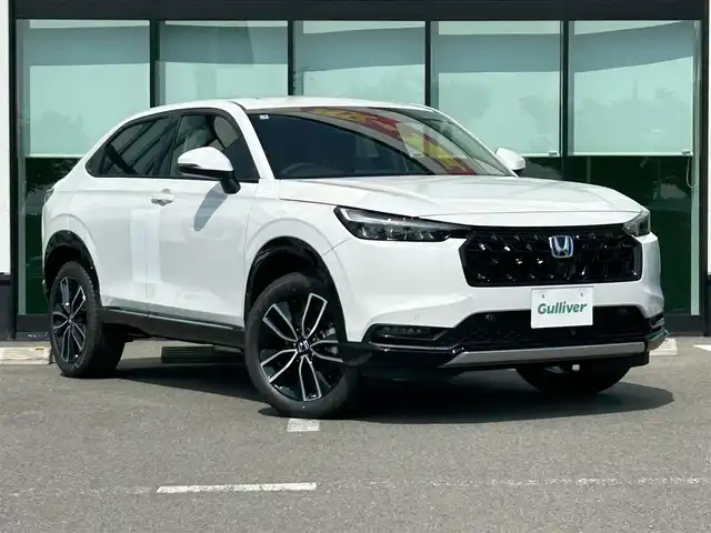 ホンダ ヴェゼル ハイブリッド e:HEV Z 和歌山県 2025(令7)年 0.1千km プラチナホワイトパール 純正Honda CONNECTディスプレーオーディオ（ナビ付）/フルセグTV/Bluetooth/USB/カープレイ/バックカメラ/ETC2.0/ワイヤレス充電器/ホンダセンシング/衝突軽減カメラ/路外逸脱抑制/BSM/踏み間違い防止機能/クリアランスソナー/レーダークルーズコントロール/革巻きステアリング/パドルシフト/ステアリングヒーター/ステアリングスイッチ/ハーフレザーシート/前席シートヒーター/LEDヘッドライト/オートライト/純正18インチAW/フロントグリル　ベルリナブラック/プッシュスタート/スマートキー/スペアキー/取扱説明書/保証書