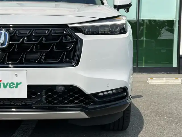 ホンダ ヴェゼル ハイブリッド e:HEV Z 和歌山県 2025(令7)年 0.1千km プラチナホワイトパール 純正Honda CONNECTディスプレーオーディオ（ナビ付）/フルセグTV/Bluetooth/USB/カープレイ/バックカメラ/ETC2.0/ワイヤレス充電器/ホンダセンシング/衝突軽減カメラ/路外逸脱抑制/BSM/踏み間違い防止機能/クリアランスソナー/レーダークルーズコントロール/革巻きステアリング/パドルシフト/ステアリングヒーター/ステアリングスイッチ/ハーフレザーシート/前席シートヒーター/LEDヘッドライト/オートライト/純正18インチAW/フロントグリル　ベルリナブラック/プッシュスタート/スマートキー/スペアキー/取扱説明書/保証書