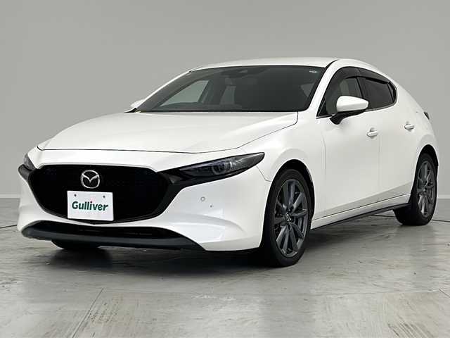 マツダ マツダ３ファストバック 20S Lパッケージ 茨城県 2020(令2)年 6万km スノーフレイクホワイトパールマイカ 純正ナビ　/全周囲カメラ　/Ｂｌｕｅｔｏｏｔｈ接続　/ＣＤ／ＤＶＤ／フルセグＴＶ　/ビルドインＥＴＣ　/ＨＤＭＩ　/ステアリングヒーター　/追従クルコン　/コーナーセンサー　/オートホールド　/メモリーシート