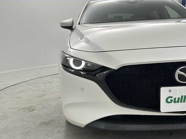 マツダ マツダ３ファストバック 20S Lパッケージ 茨城県 2020(令2)年 6万km スノーフレイクホワイトパールマイカ 純正ナビ　/全周囲カメラ　/Ｂｌｕｅｔｏｏｔｈ接続　/ＣＤ／ＤＶＤ／フルセグＴＶ　/ビルドインＥＴＣ　/ＨＤＭＩ　/ステアリングヒーター　/追従クルコン　/コーナーセンサー　/オートホールド　/メモリーシート