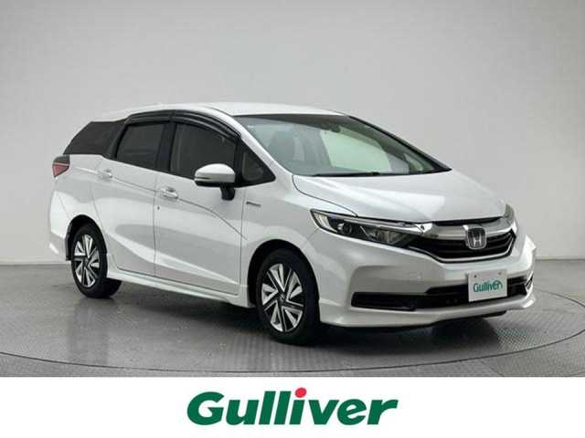 ホンダ シャトル ハイブリッド ホンダセンシング 兵庫県 2019(令1)年 6.8万km プラチナホワイトパール 社外メモリナビ(Bluetooth/SD/USB)/バックカメラ/追従型クルーズコントロール/スタッドレスタイヤ積込/レーンキープアシスト/衝突被害軽減ブレーキ/社外フロアマット/ビルトインETC/ドアバイザー/スマートキー/スペアキー/ヘッドライトレベライザー