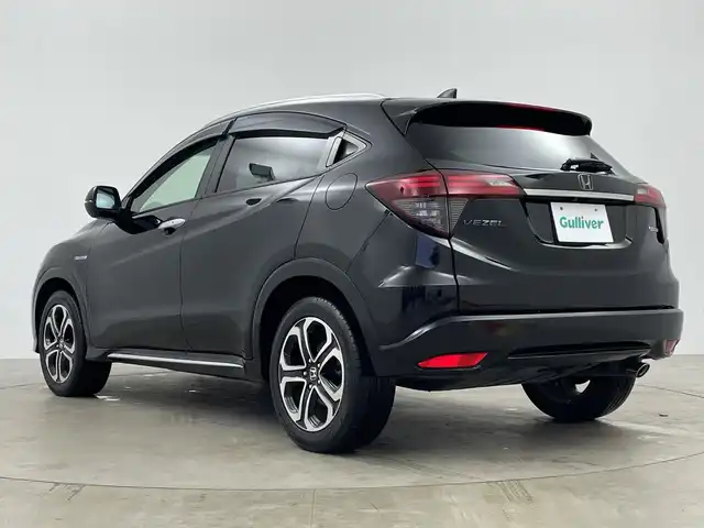 ホンダ ヴェゼル ハイブリッド Z ホンダセンシング 鹿児島県 2019(平31)年 3.1万km クリスタルブラックパール 純正ナビ/・CD/DVD/・FM/AM/・フルセグTV/・SD/Music Rack/・USB/HDMI/・Bluetooth/ホンダセンシング/●衝突軽減ブレーキ〈CMBS〉/●誤発進抑制機能/●歩行者事故低減ステアリング/●路外逸脱抑制機能/●ACC〈アダプティブ・クルーズ・コントロール〉/●LKAS〈車線維持支援システム〉/●先行車発進お知らせ機能/●標識認識機能/バックカメラ/サイドカーテンエアバッグ/LEDヘッドライト/ハーフレザーシート/運転席+助手席シートヒーター/ドライブレコーダー/ビルトインETC/アイドリングストップ/パドルシフト/横滑り防止装置