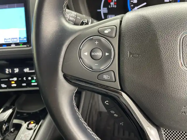 ホンダ ヴェゼル ハイブリッド Z ホンダセンシング 鹿児島県 2019(平31)年 3.1万km クリスタルブラックパール 純正ナビ/・CD/DVD/・FM/AM/・フルセグTV/・SD/Music Rack/・USB/HDMI/・Bluetooth/ホンダセンシング/●衝突軽減ブレーキ〈CMBS〉/●誤発進抑制機能/●歩行者事故低減ステアリング/●路外逸脱抑制機能/●ACC〈アダプティブ・クルーズ・コントロール〉/●LKAS〈車線維持支援システム〉/●先行車発進お知らせ機能/●標識認識機能/バックカメラ/サイドカーテンエアバッグ/LEDヘッドライト/ハーフレザーシート/運転席+助手席シートヒーター/ドライブレコーダー/ビルトインETC/アイドリングストップ/パドルシフト/横滑り防止装置