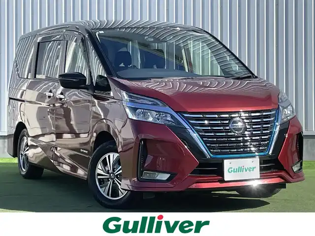 日産 セレナ e－パワー ハイウェイスター 香川県 2020(令2)年 4.4万km マルーンレッド 2トーン 登録時走行距離43310km/純正10型SDナビ/（フルセグTV/Bluetooth/DVD）/バックカメラ/純正フリップダウンモニター/純正ドライブレコーダー【DJ4-D】/エマージェンシーブレーキ/車線逸脱警報機能/クルーズコントロール/ブラインドスポットモニター/コーナーセンサー/革巻きステアリング/ステアリングスイッチ/ビルトインETC/オートライト/LEDヘッドライト/LEDフォグライト/純正15インチアルミホイール/純正フロアマット/両側スライドドア/オートエアコン/リアエアコン/2列目パーソナルテーブル/後席サンシェード/スマートキー/プッシュスタート/ウィンカー付電動格納ミラー/ISOFIX/取扱説明書