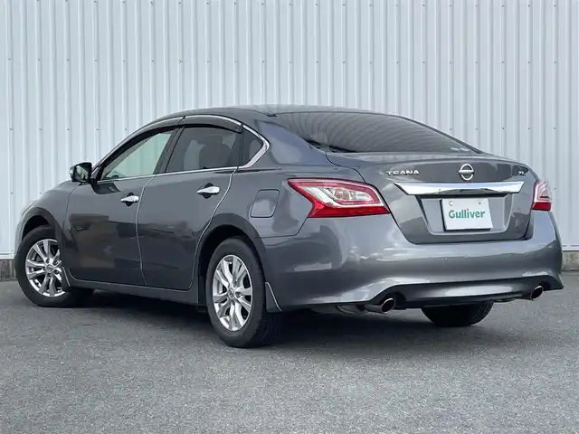 日産 ティアナ XL ナビAVMパッケージ 福岡県 2017(平29)年 7.4万km ダークメタルグレー メーカー純正ナビ/フルセグTV/CD/DVD/BT/AUX/アラウンドビューモニター/エマージェンシーブレーキ/ＢＳＷ/D/Nパワーシート/N席オットマン/ＬＤＷ/クリアランスソナー/ＨＩＤオートライト/フォグランプ/革巻きステアリング/純正ＡＷ/クルーズコントロール/ステアリングリモコン/ビルトインＥＴＣ/スマートキー/プッシュスタート/トランクスルー