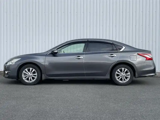 日産 ティアナ XL ナビAVMパッケージ 福岡県 2017(平29)年 7.4万km ダークメタルグレー メーカー純正ナビ/フルセグTV/CD/DVD/BT/AUX/アラウンドビューモニター/エマージェンシーブレーキ/ＢＳＷ/D/Nパワーシート/N席オットマン/ＬＤＷ/クリアランスソナー/ＨＩＤオートライト/フォグランプ/革巻きステアリング/純正ＡＷ/クルーズコントロール/ステアリングリモコン/ビルトインＥＴＣ/スマートキー/プッシュスタート/トランクスルー