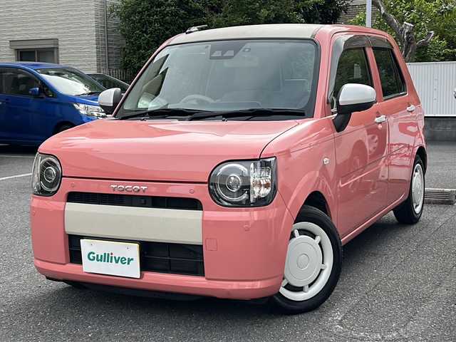 ダイハツ ミラ トコット G SA Ⅲ 埼玉県 2018(平30)年 4.7万km ジューシーピンクM 登録時46608km/スマートアシストIII/純正SDナビ(NSZN-W69D)/　AM/FM/CD/DVD/BT/フルセグTV/バックカメラ/全方位カメラ/純正ナビ連動ドライブレコーダー/ETC/シートヒーター(D.N席）/LEDヘッドライト/　オートライト/オートマチックハイビーム/  ライトレベライザー/ステアリングスイッチ/コーナーセンサー/アイドリングストップ/横滑り防止機能/プッシュスタート/スマートキー×2/電動格納機能付きウィンカーミラー/純正ドアバイザー/純正フロアマット/保証書/取扱説明書
