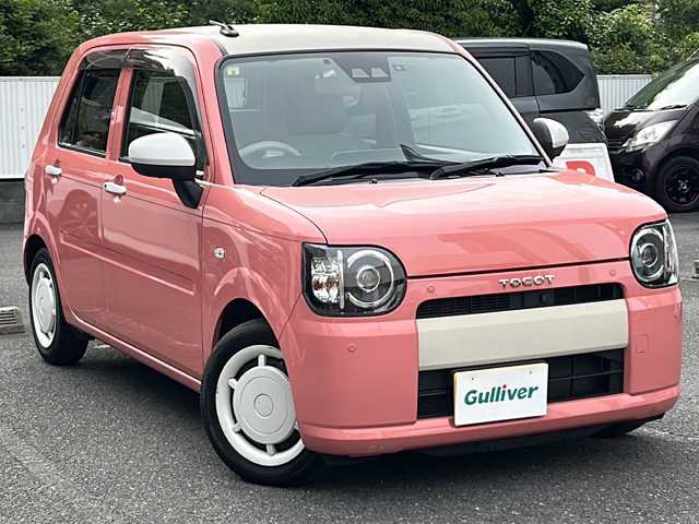ダイハツ ミラ トコット G SA Ⅲ 埼玉県 2018(平30)年 4.7万km ジューシーピンクM 登録時46608km/スマートアシストIII/純正SDナビ(NSZN-W69D)/　AM/FM/CD/DVD/BT/フルセグTV/バックカメラ/全方位カメラ/純正ナビ連動ドライブレコーダー/ETC/シートヒーター(D.N席）/LEDヘッドライト/　オートライト/オートマチックハイビーム/  ライトレベライザー/ステアリングスイッチ/コーナーセンサー/アイドリングストップ/横滑り防止機能/プッシュスタート/スマートキー×2/電動格納機能付きウィンカーミラー/純正ドアバイザー/純正フロアマット/保証書/取扱説明書