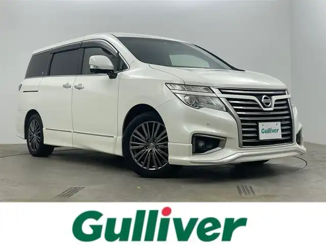 日産 エルグランド 250HWS プレミアム アーバンクロム 岡山県 2016(平28)年 8.6万km ブリリアントホワイトパール 純正メモリナビゲーション/エマージェンシーブレーキ		/１２インチフリップダウンモニター		/【フルセグ/Bluetooth/DVD/MSV】		/アラウンドビューモニター		/純正18inアルミホイール+サマータイヤ：装着		/パワーシート		/電動リアゲート	/１００V電源	/クルーズコントロール		/ビルトインETC		/LEDヘッドライト（AUTO機能付き）		/シートヒーター		/横滑り防止機能					/純正ドライブレコーダー				/スマートキー	/ステアリングスイッチ/ISOFIX		/プッシュスタート		/コーナーセンサー			/フロアマット