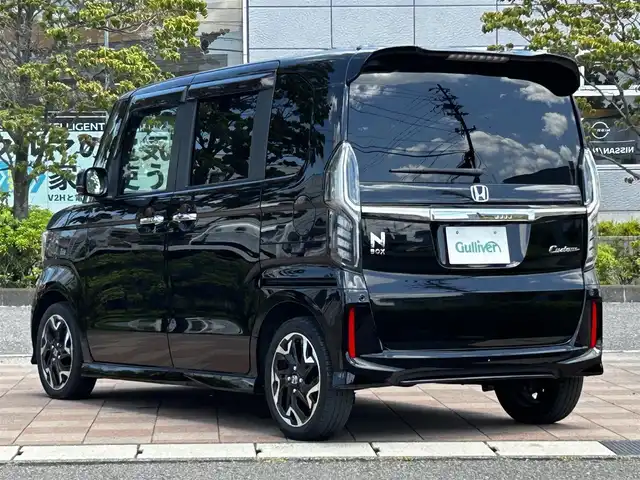 ホンダ Ｎ ＢＯＸ カスタム G L ターボ ホンダセンシング 福島県 2020(令2)年 5.7万km クリスタルブラックパール ホンダセンシング/衝突軽減ブレーキ〈CMBS〉/誤発進抑制機能/歩行者事故低減ステアリング/先行車発進お知らせ機能/標識認識機能/路外逸脱抑制機能/アダプティブクルーズコントロール〈ACC〉/車線維持支援システム〈LKAS〉/後方誤発進抑制機能/オートハイビーム/社外ナビゲーション/型番：AVN‐D10/【CD/SD/BT/TV】/バックカメラ/ビルトインETC/ドライブレコーダー/両側電動スライドドア/前席シートヒーター/ステアリングリモコン/パドルシフト/LEDオートライト/LEDフォグランプ/リアドアサンシェード/純正フロアマット/ドアバイザー