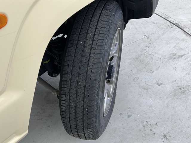 スズキ ジムニー XC 宮城県 2021(令3)年 2.4万km シフォンアイボリーM ワンオーナー/4WD/デュアルセンサーブレーキサポート/スズキセーフティサポート/・車線逸脱警報機能/・横滑り防止装置/クルーズコントロール/社外7インチナビ/・BT.CD/バックカメラ/ワンセグTV/前席シートヒーター/ETC/ドライブレコーダー（FR）/プッシュスタート/スマートキー/LEDヘッドライト/フォグライト/純正16inAW/ドアバイザー