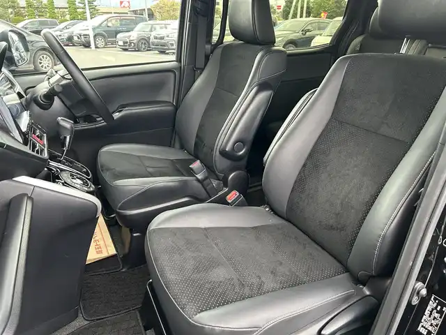 トヨタ ヴォクシー ZS 煌 栃木県 2018(平30)年 6.9万km ブラック トヨタセーフティセンス/純正10インチメモリナビ/フルセグTV/DVD/Bluetooth/MSV/純正フリップダウンモニター/バックカメラ/ETC/前後ドライブレコーダー/両側パワースライドドア/スマートキー/クルーズコントロール/ステアリングリモコン/シートバックテーブル/ロールサンシェード/LEDヘッドライト/フォグランプ/オートハイビーム/アイドリングストップ/横滑り防止装置