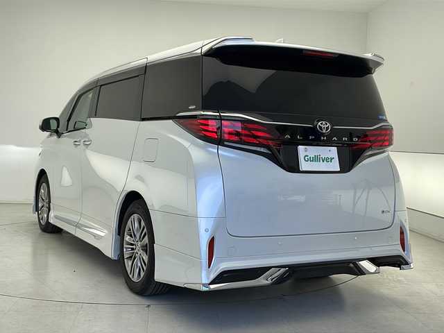 トヨタ アルファードハイブリット Z 千葉県 2023(令5)年 2.3万km プラチナホワイトパールマイカ モデリスタエアロ/純正メモリナビ/フルセグテレビ/純正フリップダウンモニター/Miracast/HDMI/ワイヤレス充電/パノラミックビューモニター/ブラインドスポットモニター/バックカメラ/アイドリングストップ/オットマン/キャプテンシート/クルーズコントロール/電動サンシェード/電動ルーフシェード/プッシュスタート/レザーコンビハンドル/電動ハンドルチルト/運転席シートメモリ/ステアリングヒーター/両側パワースライドドア/パワーバックドア/ETC2.0