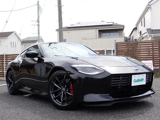 日産 フェアレディ Ｚ バージョンST 千葉県 2024(令6)年 0.1万km 黒 ワンオーナー/純正ナビゲーション/・Bluetooth/AM/FM/バックカメラ/ビルトインETC/3連サブメーター/・電圧計/ターボ回転計/ブースト計/走行支援機能/・インテリジェントクルーズコントロール/・インテリジェントエマージェンシーブレーキ/・踏み間違い衝突防止アシスト/・インテリジェントFCW（前方衝突予測警報）/・BSW（後側方車両検知警報）/・LDW（車線逸脱警報）/・インテリジェントDA（ふらつき警報）/・RCTA（後退時車両検知警報）/赤黒ハーフレザーシート/シートヒーター/プッシュスタート/インテリジェントキー2本/ステアリングスイッチ/パドルシフト/オートライト/LEDヘッドライト/純正19インチAW/純正フロアマット/ウィンカーミラー/電動格納ミラー/取扱説明書/保証書