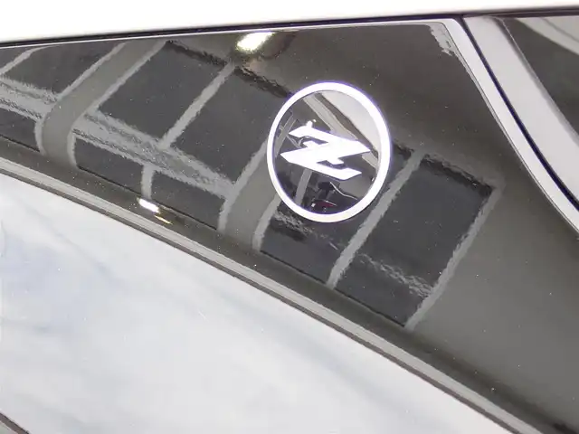 日産 フェアレディ Ｚ バージョンST 千葉県 2024(令6)年 0.1万km 黒 ワンオーナー/純正ナビゲーション/・Bluetooth/AM/FM/バックカメラ/ビルトインETC/3連サブメーター/・電圧計/ターボ回転計/ブースト計/走行支援機能/・インテリジェントクルーズコントロール/・インテリジェントエマージェンシーブレーキ/・踏み間違い衝突防止アシスト/・インテリジェントFCW（前方衝突予測警報）/・BSW（後側方車両検知警報）/・LDW（車線逸脱警報）/・インテリジェントDA（ふらつき警報）/・RCTA（後退時車両検知警報）/赤黒ハーフレザーシート/シートヒーター/プッシュスタート/インテリジェントキー2本/ステアリングスイッチ/パドルシフト/オートライト/LEDヘッドライト/純正19インチAW/純正フロアマット/ウィンカーミラー/電動格納ミラー/取扱説明書/保証書