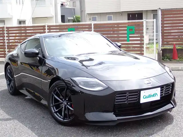 日産 フェアレディ Ｚ バージョンST 千葉県 2024(令6)年 0.1万km 黒 ワンオーナー/純正ナビゲーション/・Bluetooth/AM/FM/バックカメラ/ビルトインETC/3連サブメーター/・電圧計/ターボ回転計/ブースト計/走行支援機能/・インテリジェントクルーズコントロール/・インテリジェントエマージェンシーブレーキ/・踏み間違い衝突防止アシスト/・インテリジェントFCW（前方衝突予測警報）/・BSW（後側方車両検知警報）/・LDW（車線逸脱警報）/・インテリジェントDA（ふらつき警報）/・RCTA（後退時車両検知警報）/赤黒ハーフレザーシート/シートヒーター/プッシュスタート/インテリジェントキー2本/ステアリングスイッチ/パドルシフト/オートライト/LEDヘッドライト/純正19インチAW/純正フロアマット/ウィンカーミラー/電動格納ミラー/取扱説明書/保証書
