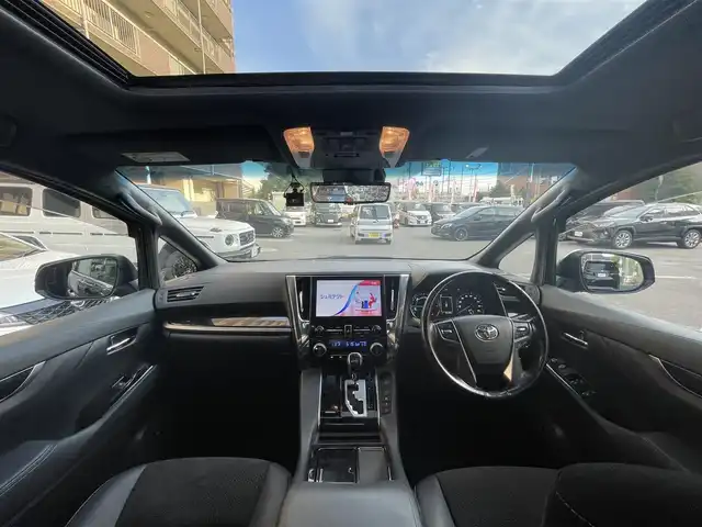 トヨタ アルファードハイブリット S タイプゴールド 大阪府 2021(令3)年 6.6万km ブラック メーカーOP10.5インチSDナビ/TV/DISC/Bluetooth//パノラミックビューモニター/JBLプレミアムサウンドシステム/13.3インチリアシートエンターテイメントシステム/ツインムーンルーフ/デジタルインナーミラー/トヨタセーフティセンス/ブラインドスポットモニター/リアクロストラフィックオートブレーキ/インテリジェントクリアランスソナー/インテリジェントパーキングアシスト2/アダプティブハイビーム/レーダークルーズコントロール/プリクラッシュセーフティー/ロードサインアシスト/シーケンシャルLEDヘッドライト/ETC2.0/スマートキー×2