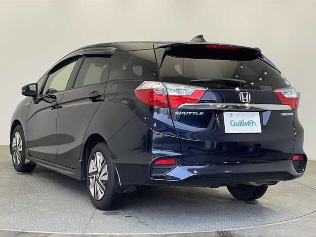 ホンダ シャトル ハイブリッド X ホンダセンシング 栃木県 2019(平31)年 2.1万km ミッドナイトブルービームM ワンオーナー/純正ナビ/　（CD/DVD/ワンセグTV/Bluetooth）/バックカメラ/ホンダセンシング/●衝突軽減ブレーキ〈CMBS）/●誤発進抑制機能/●歩行者事故低減ステアリング/●路外逸脱抑制機能/●ACC〈アダプティブ・クルーズ・コントロール〉/●LKAS〈車線維持支援システム〉/●先行車発進お知らせ機能/●標識認識機能/ETC/ドライブレコーダー/前席シートヒーター/禁煙車/LEDヘッドライト/スマートキー/プッシュスタート