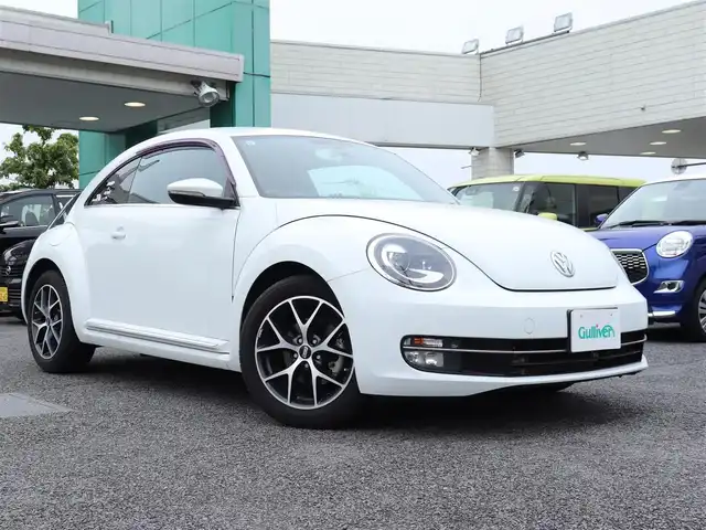 フォルクスワーゲン ザ・ビートル デザイン 神奈川県 2015(平27)年 3.6万km 白 BBS17インチAW/社外ナビ/：CD/DVD/：フルセグTV/：Bluetoothオーディオ対応/バックカメラ/ETC/クルーズコントロール/AUX端子/純正フロアマット/ドアバイザー/純正16インチホイール＋ホイールキャップあり/スペアキー