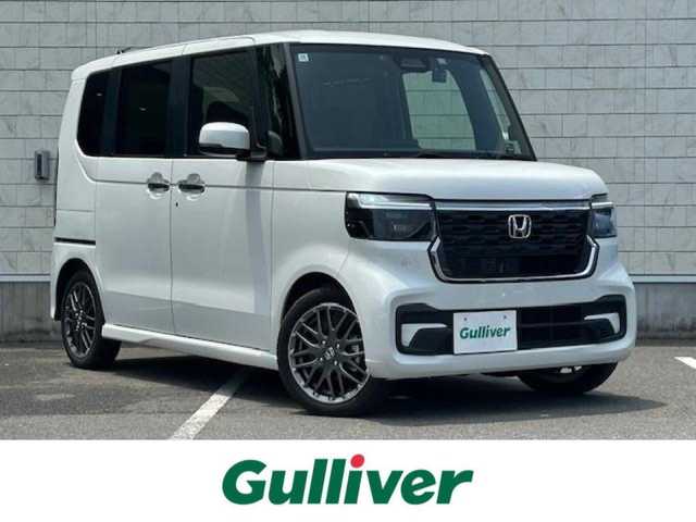 ホンダ Ｎ ＢＯＸ カスタム ターボ 大阪府 2024(令6)年 0.5万km プラチナホワイトパール ナビ　/地デジ　/Ｂｌｕｅｔｏｏｔｈ　/バックカメラ　/両側パワースライドドア　/ハーフレザーシート　/シートヒーター　/レーダークルーズコントロール　/ドラレコ　/ＥＴＣ　/スマートキー　/ＬＥＤヘッドライト