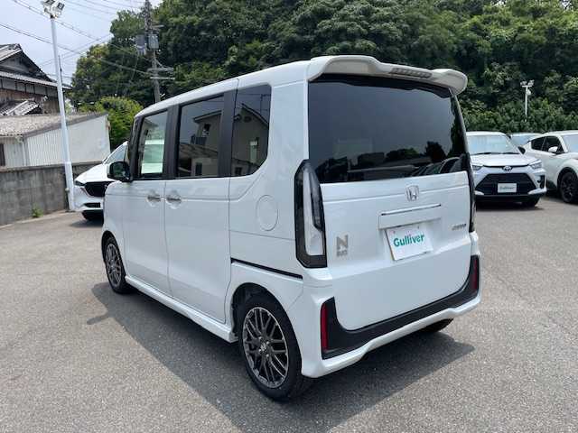 ホンダ Ｎ ＢＯＸ カスタム ターボ 大阪府 2024(令6)年 0.5万km プラチナホワイトパール ナビ　/地デジ　/Ｂｌｕｅｔｏｏｔｈ　/バックカメラ　/両側パワースライドドア　/ハーフレザーシート　/シートヒーター　/レーダークルーズコントロール　/ドラレコ　/ＥＴＣ　/スマートキー　/ＬＥＤヘッドライト