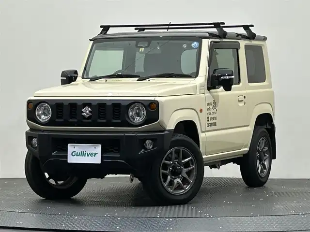 スズキ ジムニー XC 愛媛県 2022(令4)年 2.2万km シフォンアイボリーメタリックブラック2トーンルーフ ・社外ディスプレイオーディオ/（ＡＭＦＭ・ＣＤ・ＢＴオーディオ）/・バックカメラ　/・純正マットガード　/・前後ドラレコ　/・ドリンクホルダー　/・ＥＴＣ