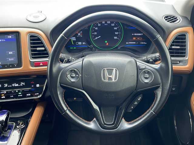 ホンダ ヴェゼル ハイブリッド Z 沖縄県 2015(平27)年 12万km ゴールドブラウンM 純正８型ナビ(VXM-155VFEi)　/(フルセグＴＶ　ＤＶＤ再生　ＢＴ接続)/バックカメラ　/ＨＤＭＩ　/ドライブレコーダー　/クルーズコントロール　/ＥＴＣ　/パドルシフト　/ハーフレザーシート　/シートヒーター　/ＬＥＤオートライト　/フォグランプ/ドアバイザー